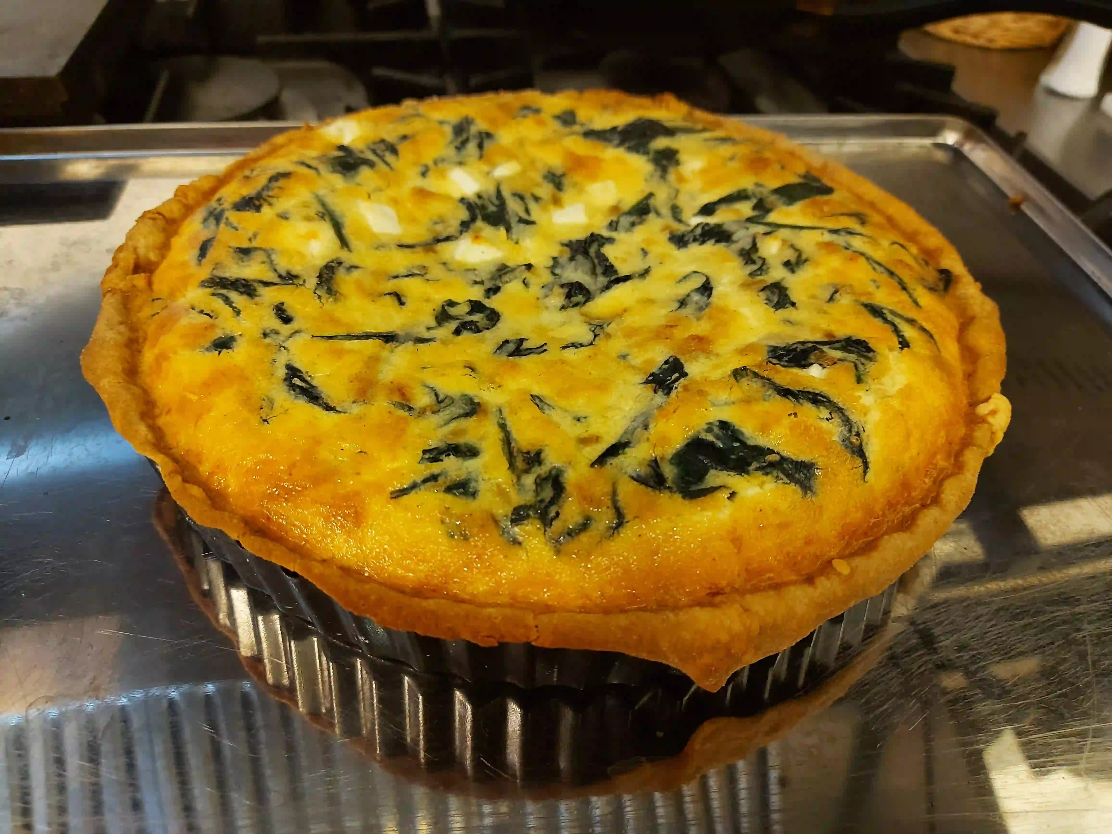 Home-made spinach and feta quiche