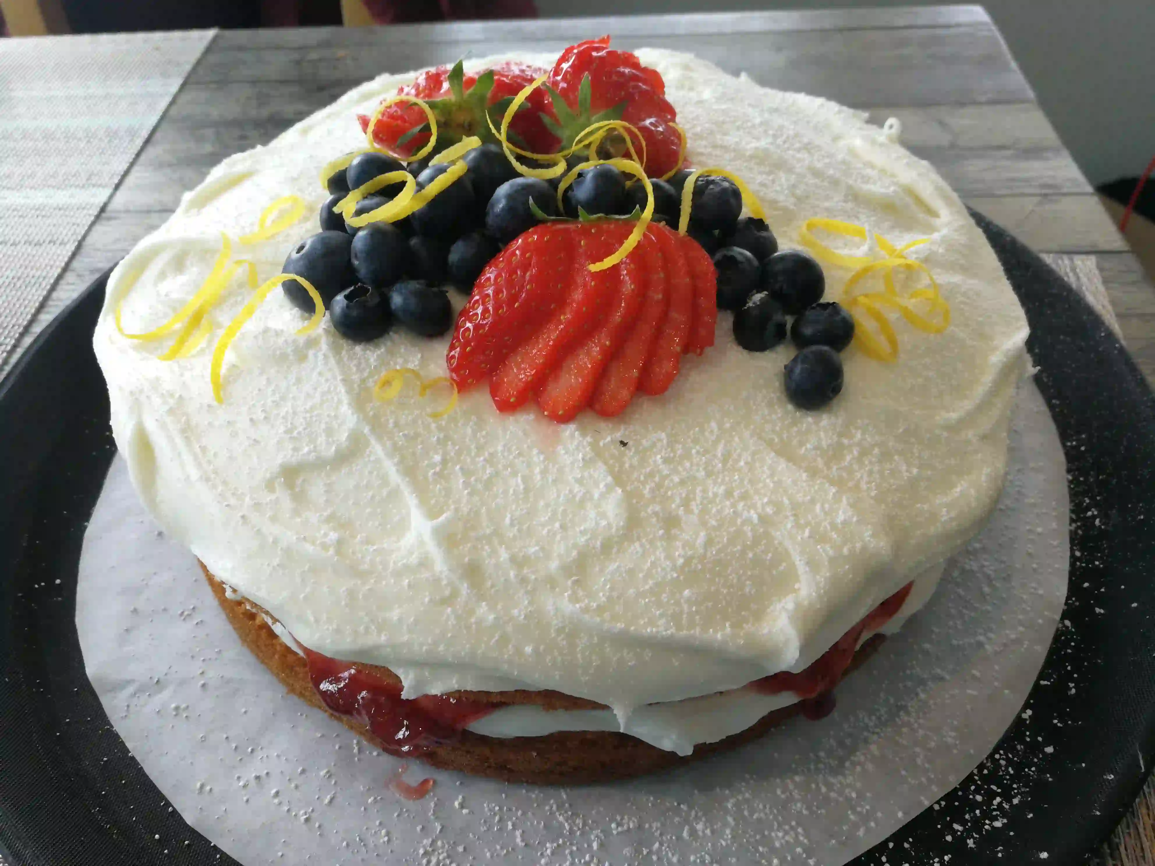 Victoria sponge cake with summer berry topping